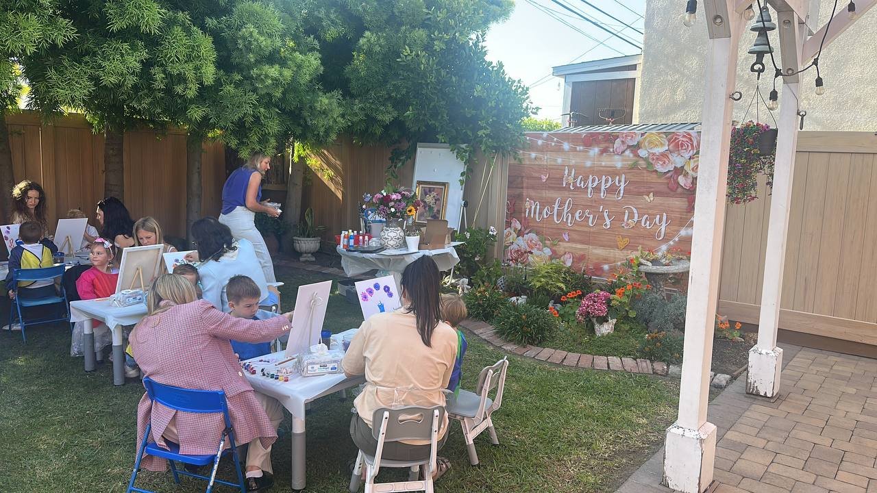 Painting together in the backyard
